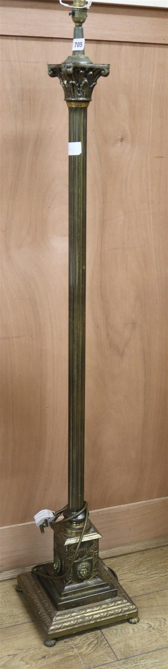 A brass corinthian column standard lamp W.24cm at base